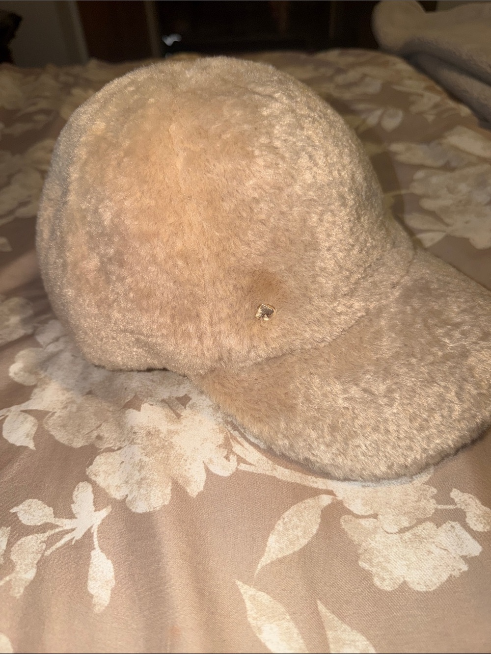 kate spade beige faux fur baseball cap with gold logo charm